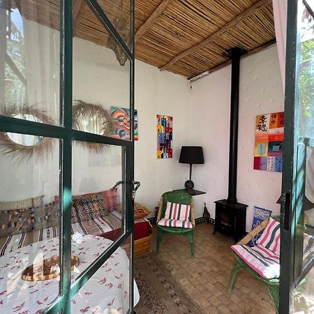 Riad Oasis D'Асила Экстерьер фото