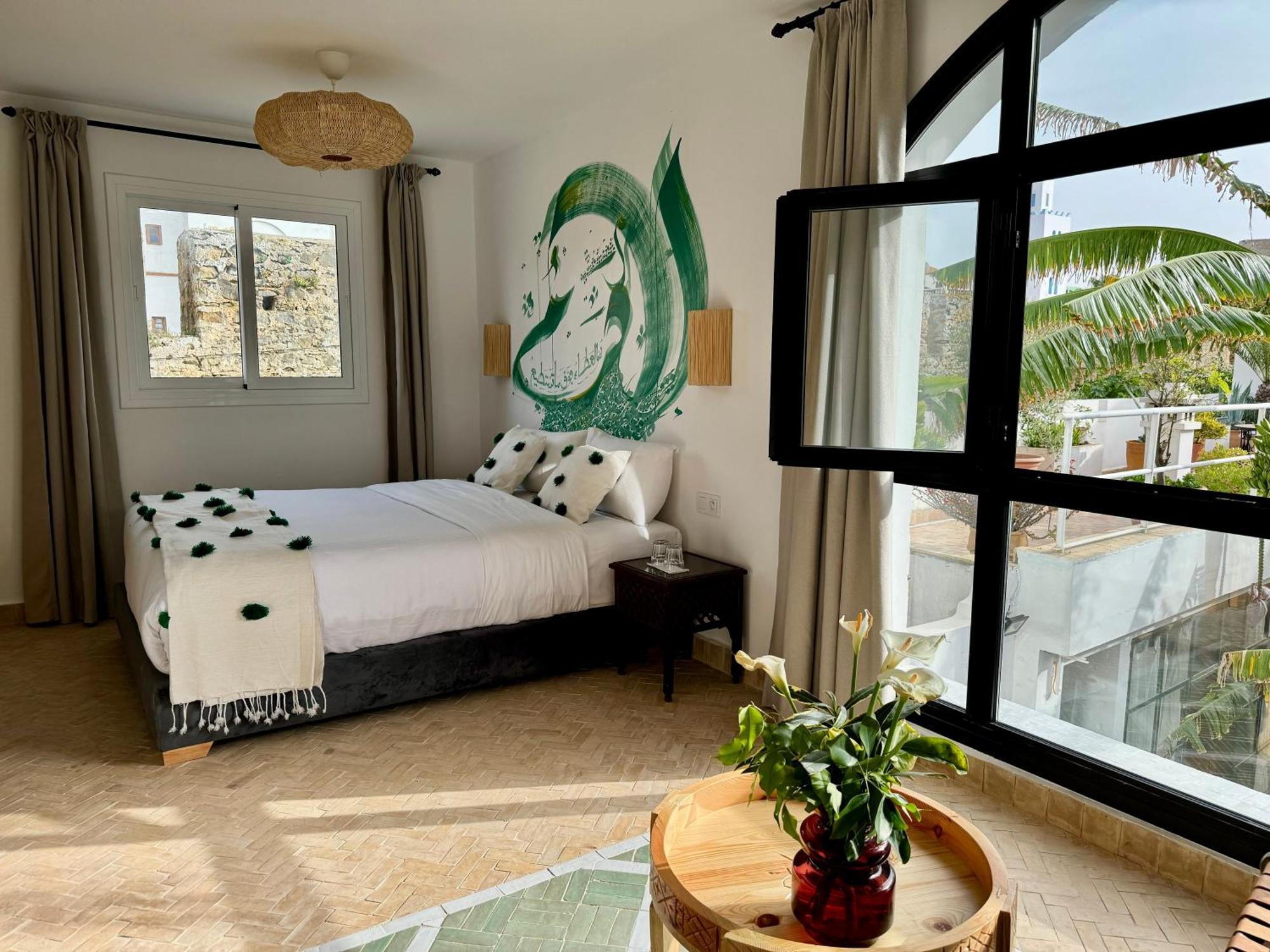 Riad Oasis D'Асила Экстерьер фото