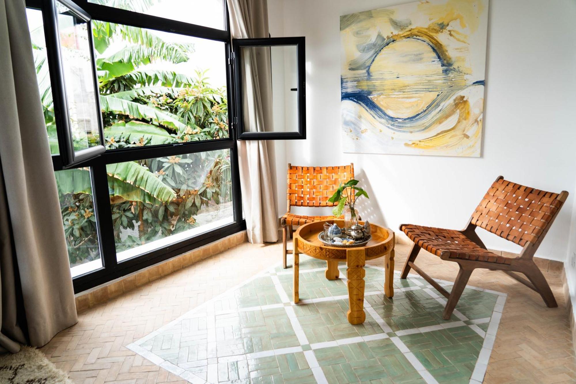 Riad Oasis D'Асила Экстерьер фото