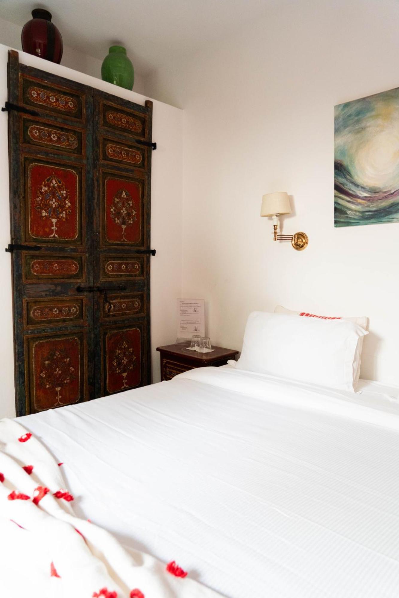 Riad Oasis D'Асила Экстерьер фото