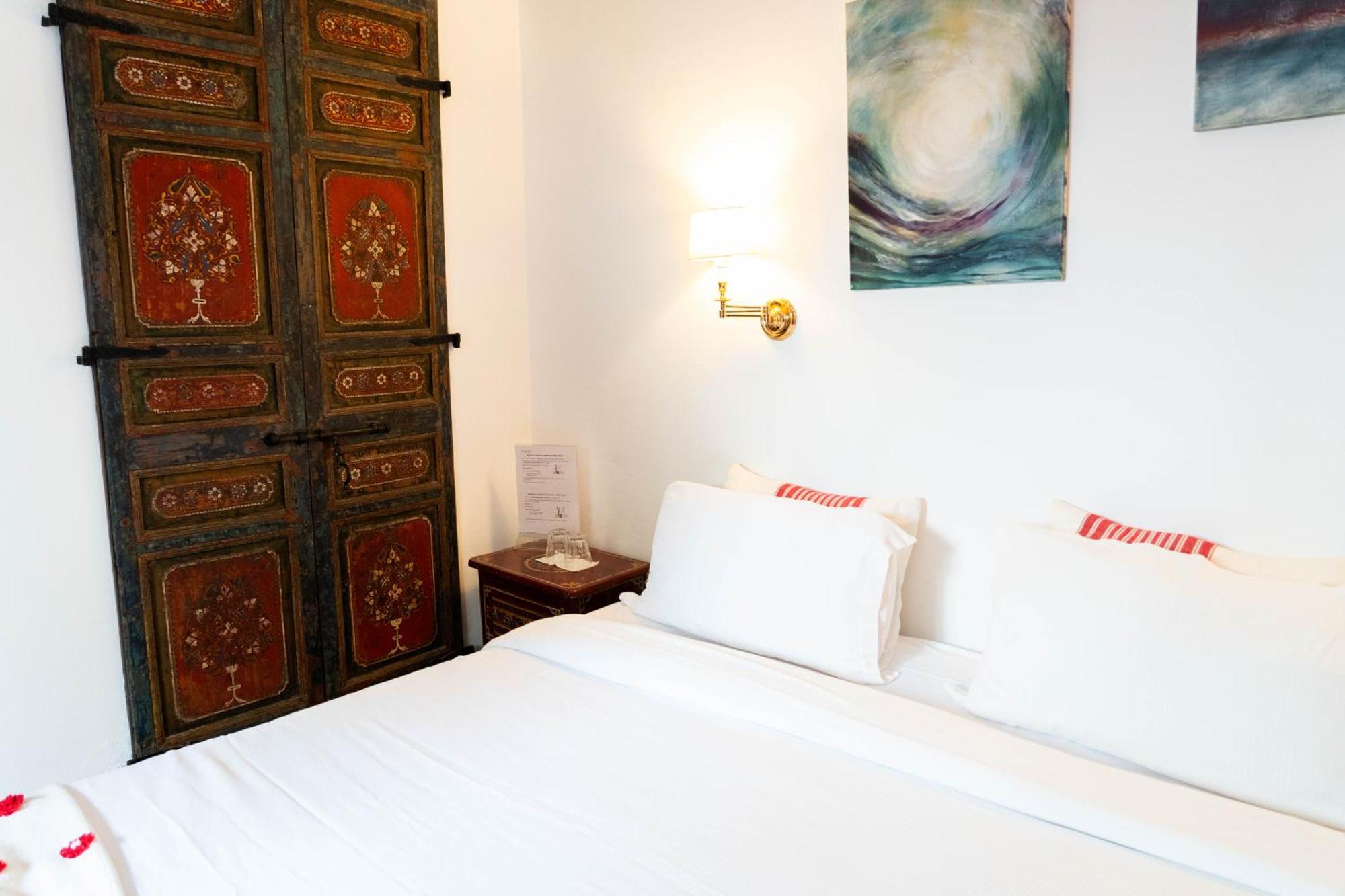 Riad Oasis D'Асила Экстерьер фото