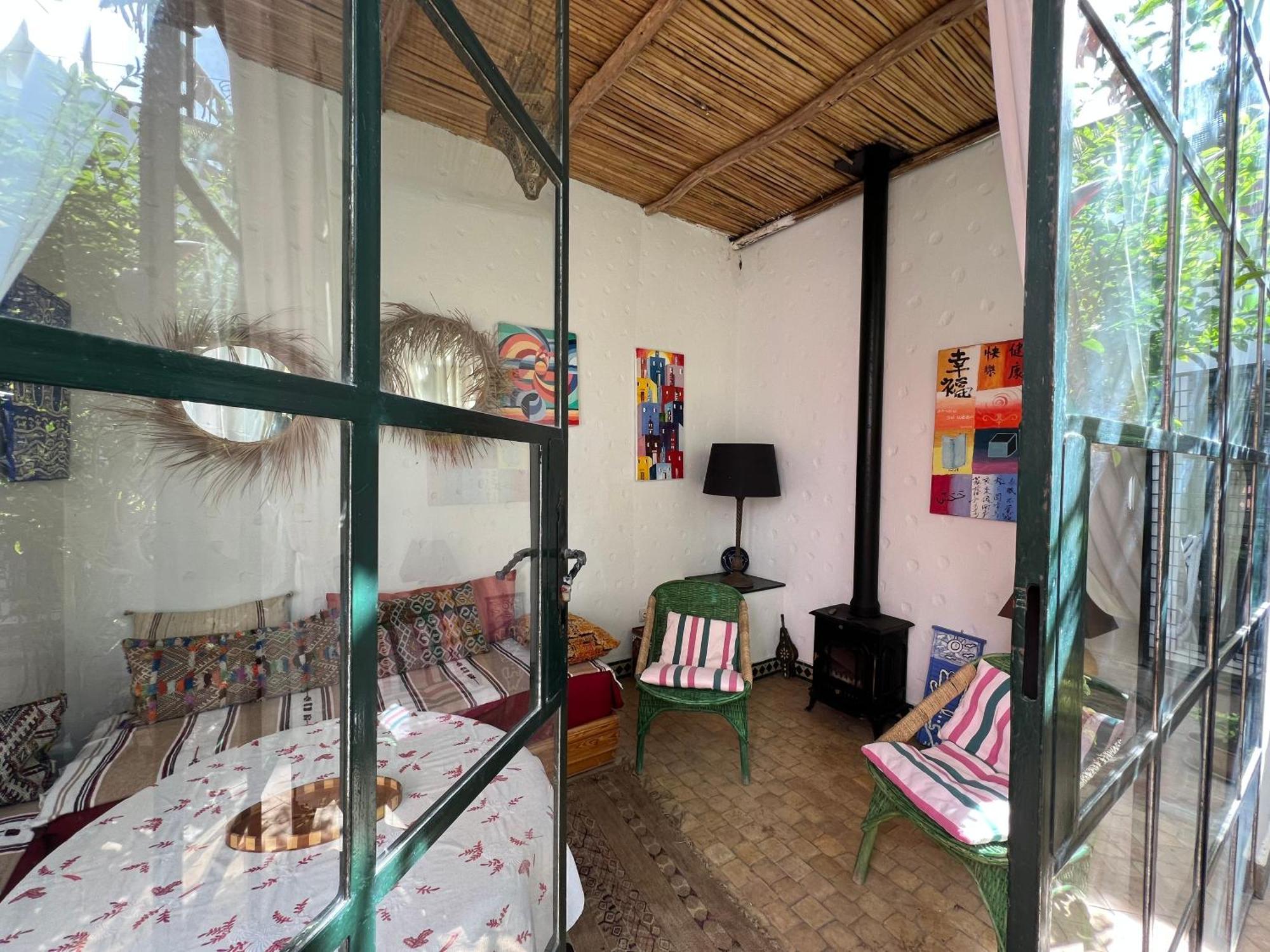 Riad Oasis D'Асила Экстерьер фото