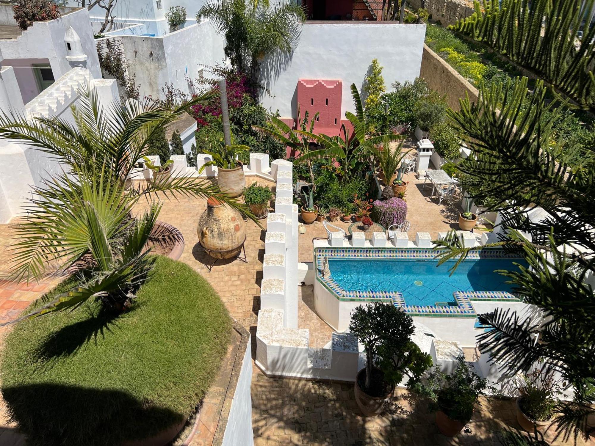 Riad Oasis D'Асила Экстерьер фото