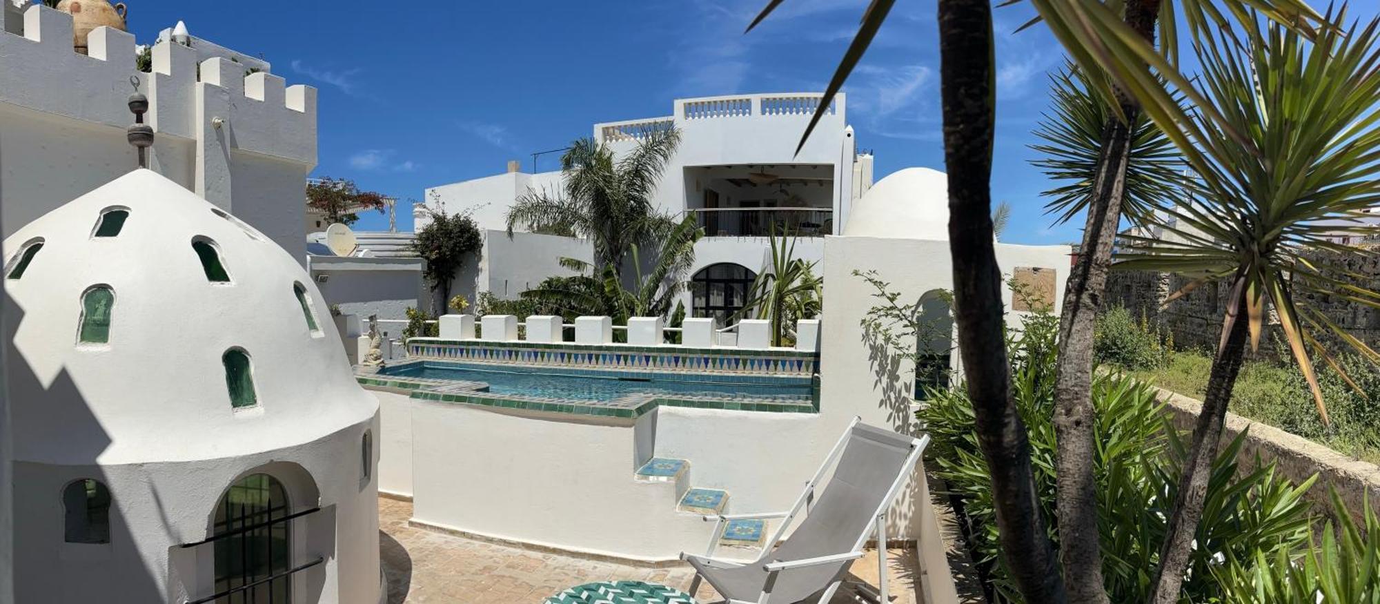 Riad Oasis D'Асила Экстерьер фото