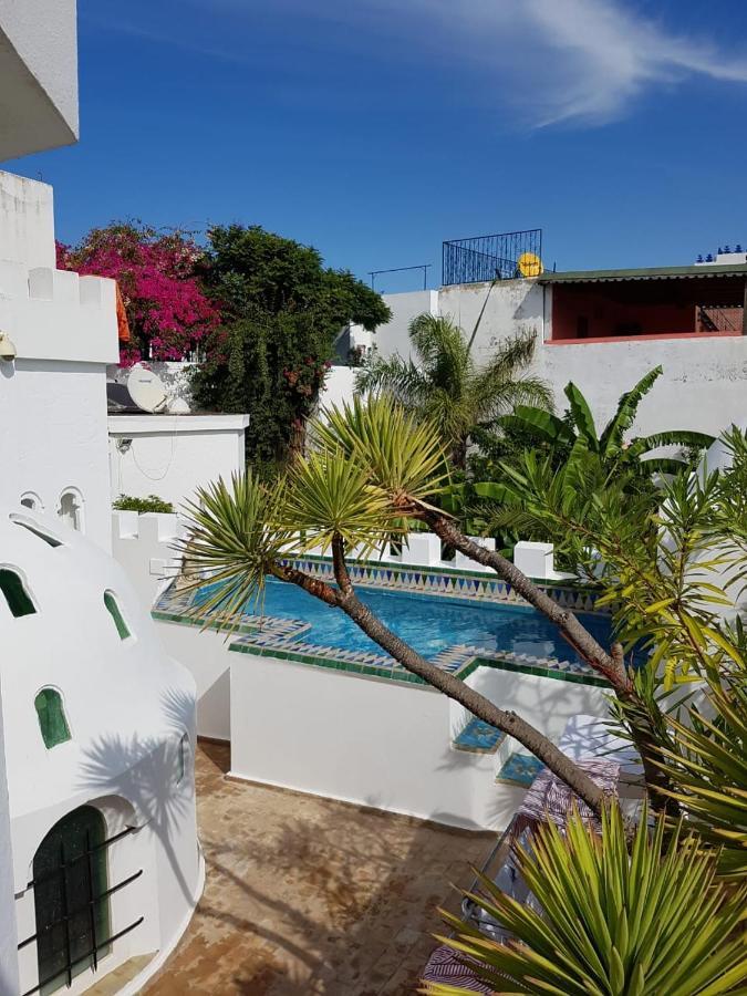 Riad Oasis D'Асила Экстерьер фото
